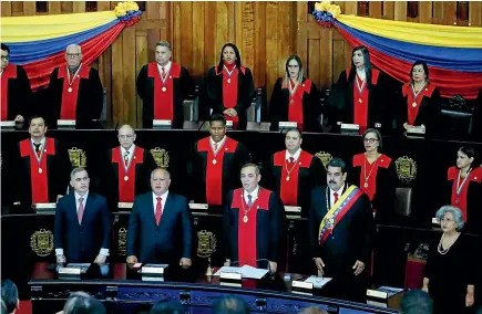  ?? AP ?? Venezuelan President Nicolas Maduro, front row wearing sash, attends the Supreme Court’s annual ceremony marking the start of the judicial year in Caracas. In the front row, from left, are Chief Prosecutor Tarek William Saab, Constituti­onal Assembly President Diosdado Cabello, Supreme Court President Maikel Jose Moreno Perez and National Electoral Council President Tibisay Lucena.
