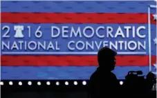  ?? Associated Press ?? A member of the media shoots video Sunday during setup before the 2016 Democratic Convention in Philadelph­ia.