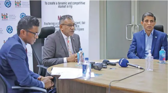  ?? Photo: DEPTFO News ?? From left: Fijian Competitio­n and Consumer Commission chief executive officer Joel Abraham, Minister for Commerce, Trade, Tourism and Transport Faiyaz Koya and Permanent Secretary for Commerce, Trade and Tourism Shaheen Ali during a joint press conference on April 30, 2020.