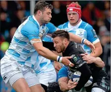  ??  ?? CAUGHT: Ali Price of Glasgow Warriors is tackled by Cian Healy and Robbie Henshaw (left) at Scotstoun Stadium