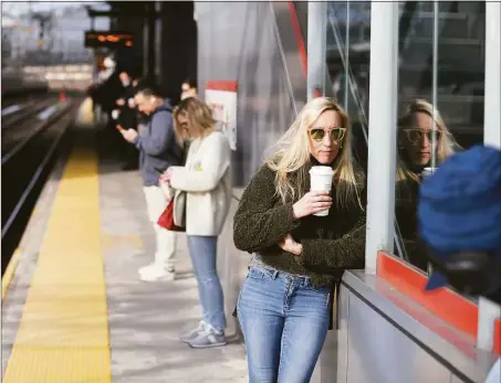  ?? Tyler Sizemore / Hearst Connecticu­t Media file photo ?? Metro-North passengers during rush hour in March in Stamford. As employers look to bring more people back to the office, a new survey suggests four in 10 could look for new jobs this year if they lose some or all of their remote working allowances.