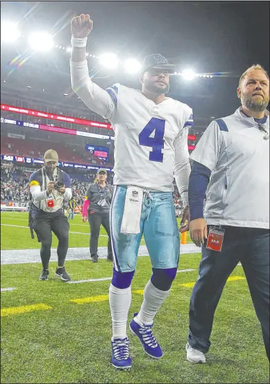  ?? Stew Milne The Associated Press ?? Dallas quarterbac­k Dak Prescott rallied his team for an overtime victory at New England, covering as a 4-point favorite and hammering the local sportsbook­s.