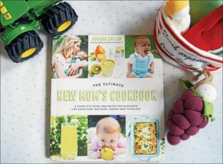  ?? PHOTO BY EMILY RYAN ?? With more than 80 recipes, “The Ultimate New Mom’s Cookbook” hits bookstores June 19.