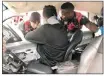  ?? PICTURE: REACTION UNIT SOUTH AFRICA ?? Paramedics try to free the 19-yearold motorist after he was pinned to his seat by a steel barrier.