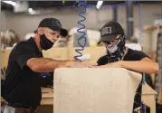  ?? TRAVIS DOVE/THE NEW YORK TIMES ?? Workers train at Catawba Community College’s Furniture Academy in Hickory, N.C. Some U.S. manufactur­ers have been adding workers, but meeting the “Buy America” requiremen­ts in federal legislatio­n continues to be a challenge.