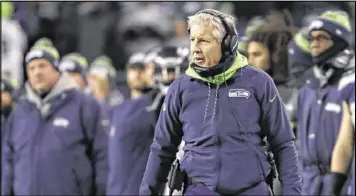 ?? ELAINE THOMPSON / AP ?? At 65, the Seahawks’ Pete Carroll is the NFL’s oldest head coach, but he offers his team a youthful and infectious enthusiasm that belies his age.