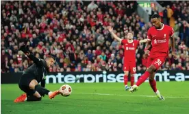  ?? ?? Ryan Gravenberc­h gives Liverpool the lead with his first goal for the club. Photograph: Jon Super/AP