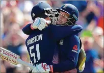  ??  ?? Run machines: Jonny Bairstow and Joe Root embrace as they give England the perfect start, both hitting centuries