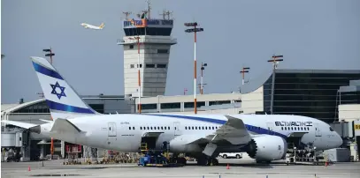  ?? (Tomer Neuberg/Flash90) ?? AN EL AL Boeing Dreamliner is prepared for its next flight at Ben Gurion Airport last month.