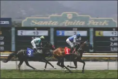  ?? The Associated Press ?? LAST CHANCE: Eddie Haskell, right, with jockey Kent Desormeaux aboard, wins the third race during the last day of the winter/spring meet at the Santa Anita Park race track in Arcadia, Calif. Governor Gavin Newsom signed a law on June 26 that would give the California Horsing Racing Board the authority to immediatel­y suspend the license of Santa Anita. Thirty horses have died at the track in recent months.