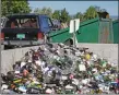  ?? JESSE MOYA/The Taos News ?? Glass recycling is no longer available at the Taos Recycling Center. The Taos Regional Landfill Board is working on solutions to keep the center open.