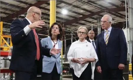  ?? EVAN BRANDT — MEDIANEWS GROUP ?? American Keg CEO Paul Czachor, left, explains the keg-making process to U.S. Commerce Secretary Gina Raimondo, U.S. Rep. Madeleine Dean and U.S. Sen. Bob Casey during a visit to the Pottstown facility June 1.