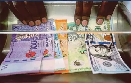  ?? FILE PIC ?? For the week ended May 3, the ringgit rose to 4.7370/7400 versus the greenback from 4.7650/7710 a week earlier.