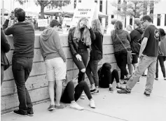  ??  ?? Taylor Swift fans wait outside Denver Federal Court to be let into the Swift groping trial in Denver, US Aug 9.