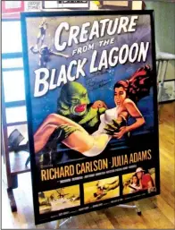  ?? Special to the Democrat-Gazette/MARCIA SCHNEDLER ?? On display at the Hot Spring County Museum is a poster for the 1954 movie The Creature From the Black Lagoon. It is signed by actress Julie (then Julia) Adams, who lived in Malvern while attending high school.