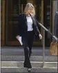  ?? THE NEW YORK TIMES ?? Aimee Harris leaves Federal District Court after pleading guilty to stealing a diary and other belongings of President Joe Biden's daughter, Ashley Biden, in Manhattan in 2022.