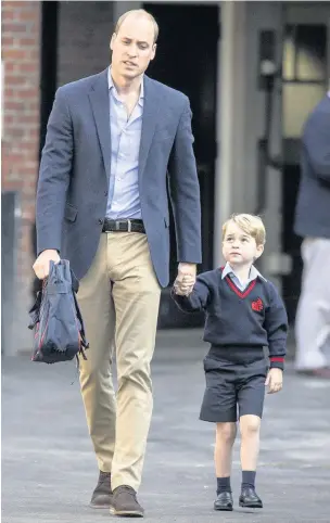  ?? Richard Pohle/The Times/PA Wire ?? ●●Prince George arrives with his dad Prince William at Thomas’s Battersea in London as he starts his first day of school