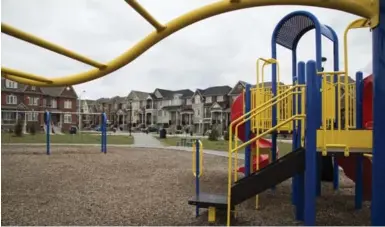  ?? MELISSA RENWICK PHOTOS/TORONTO STAR ?? The Joseph Bannon Park sits as a centrepiec­e in the BIA’s Westown housing project.