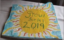  ?? PHOTO BY MICHILEA PATTERSON – FOR MEDIANEWS GROUP ?? A painted flagstonew­ith the words “grow for it” is on display during the 2019Home Garden Contest awards ceremony. First-place winners of the competitio­n received a flagstone to take home with them.