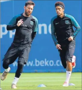  ?? AP PHOTO ?? Barcelona's Lionel Messi (left) and Neymar attend a training session at the Sports Center FC Barcelona Joan Gamper in Sant Joan Despi, Spain on Tuesday.