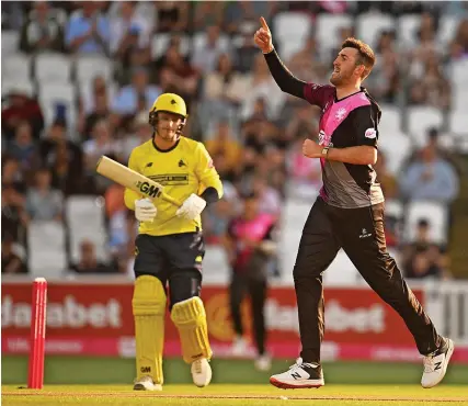  ?? Picture: Harry Trump/Getty ?? Craig Overton celebrates his dismissal of Hampshire’s Toby Albert on Wednesday night