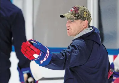  ?? M AT H E W MCCARTHY WATERLOO REGION RECORD FILE PHOTO ?? Kitchener Rangers general manager and head coach Mike McKenzie isn’t sure if he’ll be back in a double role next season.