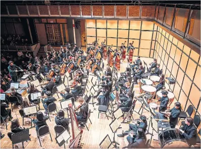  ?? ALLAN CABRAL TORONTO SYMPHONY ORCHESTRA ?? The Toronto Symphony Youth Orchestra takes direction from conductor Simon Rivard.