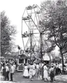  ?? Detre Library & Archives, Heinz History ?? Visitors to Kennywood ride the Eli Wheel, while groups of people gather on the ground below. It was made by the Eli Bridge Company of Jacksonvil­le, Ill.