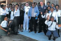  ?? Picture: SIBONGILE NGALWA ?? FEELING PROUD: Excitement filled the dusty streets of Mzamomhle as officials from the US Mission to South Africa drove into the township to officially open and hand over the newly renovated Mzamowethu Public School in East London