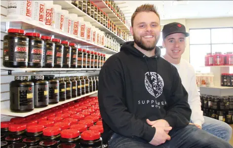  ?? PHOTOS: MORGAN MODJESKI ?? Josh MacGowan, left, the owner of Supplement World, and store manager Colby Stern, at the venture’s new outlet in Blairmore.