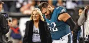  ?? RICH SCHULTZ / ASSOCIATED PRESS ?? First lady Jill Biden talks with Eagles center Jason Kelce before a game against the Cowboys on Oct. 16 in Philadelph­ia.