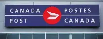  ?? DARRYL DYCK/THE CANADIAN PRESS ?? Canada Post is reporting a Q2 loss of $242M and directly linking it to what it expects will be a massive payout to resolve a pay equity dispute with its biggest union.