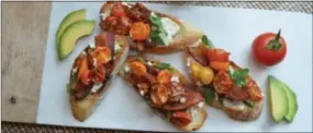  ?? PHOTO COURTESY OF SONYA KEISTER ?? Roasted Tomato and Goat Cheese BLTs make fabulous party hors d’oeuvres. They’re also wonderful for wine country picnics. Prep the components ahead of time and assemble the BLTs at your picnic site, says Rustic Fork food blogger Sonya Keister.