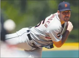  ?? The Associated Press ?? Justin Verlander, formerly of the Detroit Tigers, pitches against the Colorado Rockies on Wednesday in Denver. On Thursday, Verlander was traded to the Houston Astros.