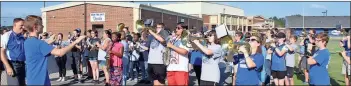  ?? / Spencer Lahr ?? The Model High band plays “Sweet Caroline” during the Model area pep rally Friday to mark homecoming.