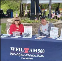  ?? COURTESY OF GABRIELLE BRUNO ?? Ann and Peter Krill staff the WFIL table in Rose Tree Park last year at the National Day of Prayer.