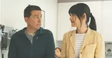  ?? LEVELFILM ?? Actors Ed Helms, left, and Patti Harrison have perfectly imperfect chemistry in the offbeat comedy Together Together.