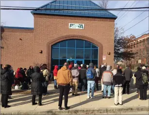  ?? Joseph Fitzgerald/The Call ?? Approximat­ely 75 protesters rallied outside Rhode Island Public Transit Authority (RIPTA) headquarte­rs in Providence Monday in an effort to save the No Fare Pass.