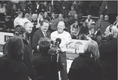  ?? COURTESY OF TSN. ?? TSN’s Vic Rauter, shown interviewi­ng Kevin Martin, will be in Montreal for the Scotties Tournament of Hearts, which starts Saturday at the Maurice Richard Arena.