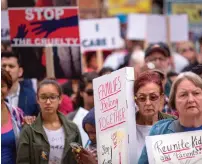  ?? AFP ?? Protesters demand that thousands of children taken from their immigrant parents by border officials under recent controvers­ial Trump administra­tion policies be reunited, in San Diego. —