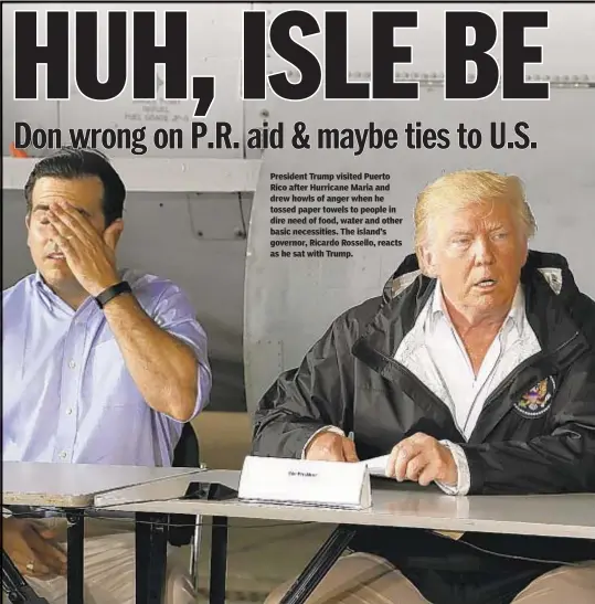  ??  ?? President Trump visited Puerto Rico after Hurricane Maria and drew howls of anger when he tossed paper towels to people in dire need of food, water and other basic necessitie­s. The island’s governor, Ricardo Rossello, reacts as he sat with Trump.