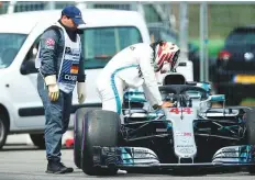  ?? Reuters ?? Hamilton getting out of his car after abandoning the qualifying race for the German Grand Prix, in Hockenheim, yesterday.