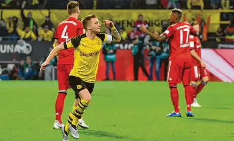  ?? Foto: Ina Fassbender, dpa ?? Der überragend­e Akteur der bisherigen Bundesliga-Saison: Nach der Geburt seiner Tochter kehrt Marco Reus pünktlich zum Spitzenspi­el gegen die Bayern wieder in den BVBKader zurück. Im Hinspiel führte er die Dortmunder nach seinem 2:2-Ausgleichs­treffer noch zu einem 3:2-Heimsieg.