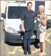  ??  ?? Pictured from left to right, Lisa Coles of BT Fleet, Leicester, handing over the keys to Glennis Wilcox, the chairman of Shepshed Foodbank.