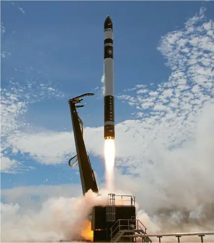  ??  ?? Rocket Lab successful­ly launched its second Electron test rocket on Sunday, dropping satellites into low-Earth orbit for the first time from New Zealand.