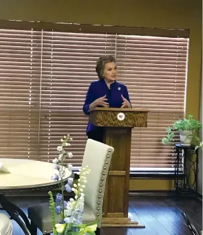  ?? Staff photo by Ashley Gardner ?? ■ Arkansas first lady Susan Hutchinson spoke Monday afternoon at the Texarkana Children’s Advocacy Center. She’s visiting CACs around the state to help raise awareness of the work they do helping children overcome abuse.