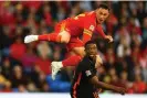  ?? ?? Tyrell Malacia stays grounded as Connor Roberts jumps during this month’s Nations League game between Wales and the Netherland­s in Cardiff. Photograph: Michael Steele/Getty Images