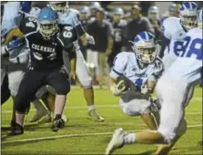  ?? BY SAM BLUM - SBLUM@DIGITALFIR­STMEDIA.COM ?? Logan Souza runs a ball in for a touchdown in Shaker’s 41-0 win over Columbia on Friday, Oct. 13, 2017. He has two touchdowns this season.