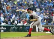  ?? NAM Y. HUH — THE ASSOCIATED PRESS ?? Nationals starting pitcher Stephen Strasburg throws during victory in Game 4 of National League Division Series against Cubs, Wednesday in Chicago.