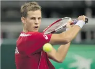  ?? ANDREW VAUGHAN/Canadian Press ?? Vasek Pospisil participat­es in a Davis Cup practice session in Halifax. Canada will host Colombia in a playoff to determine if Canada stays in the elite World Group.